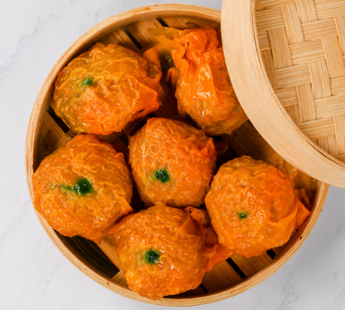 RTK Big Beef Siomai served in an open bamboo steamer basket.