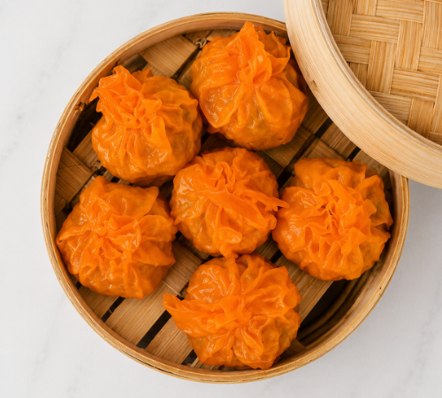 RTK Big Sharksfin Dumplings served in an open bamboo steamer basket.