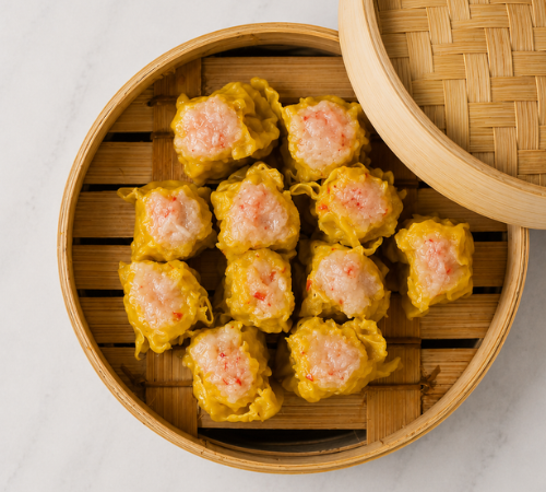 RTK Lobster Siomai served in an open bamboo steamer basket.