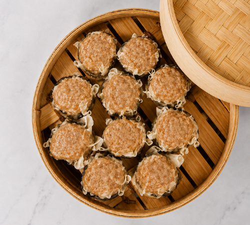RTK Pork and Shrimp Siomai served in an open bamboo steamer basket.