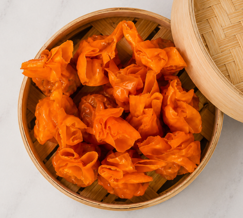 RTK Sharksfin Dumpling served in an open bamboo steamer basket.